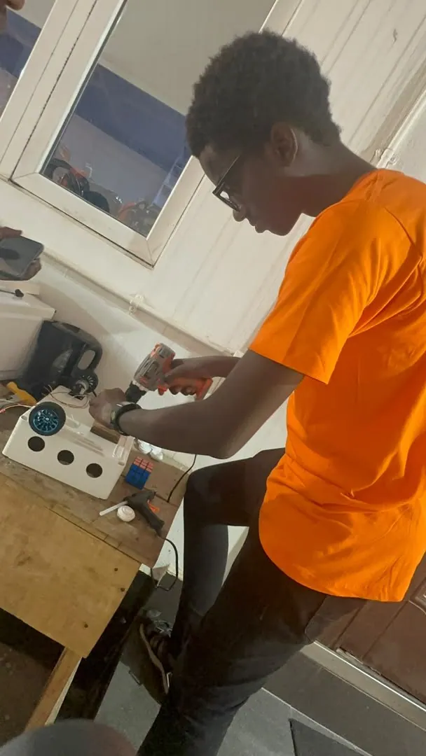 A trainee testing hardware