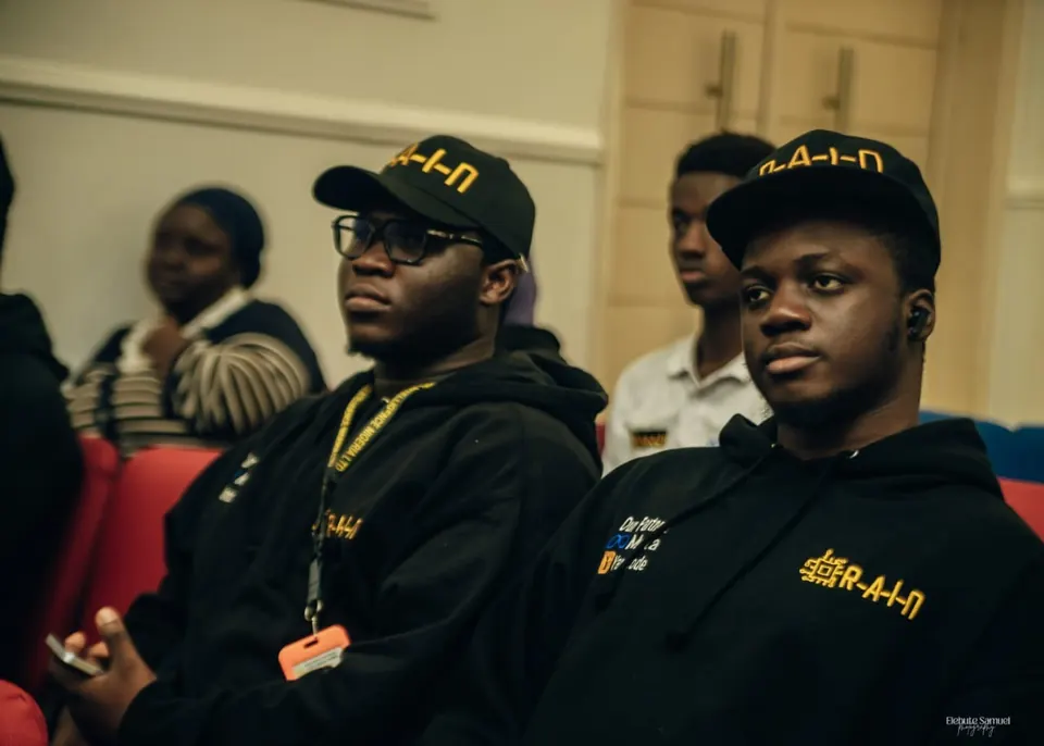 RAIN trainees listening during a seminar